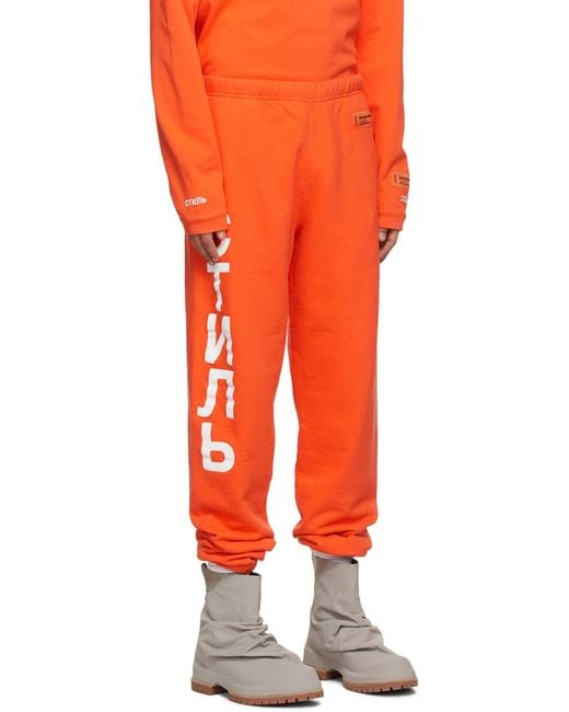 Heron Preston Orange Logo Print Elasticated-Waist Track Pants for men