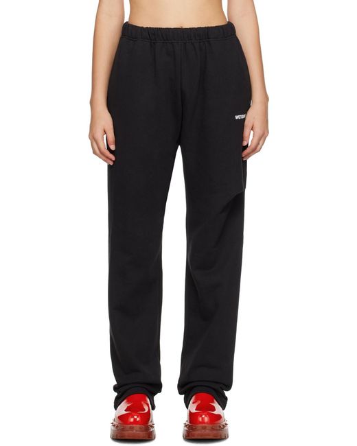 we11done Black Logo-Print Track Pants for men