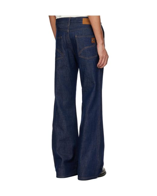 Amiri Blue Raw Boot Cut Jeans for men