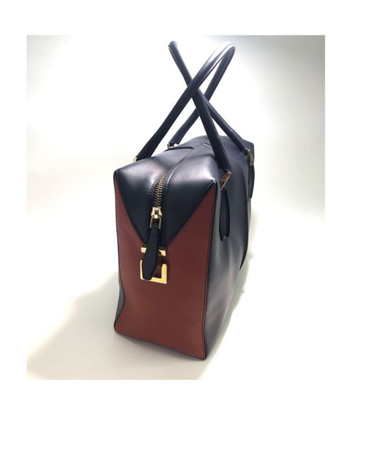 Tod's Blue Zippered Handbag