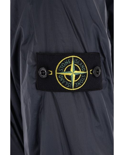 Stone Island Blue Compass-Patch Padded Jacket for men