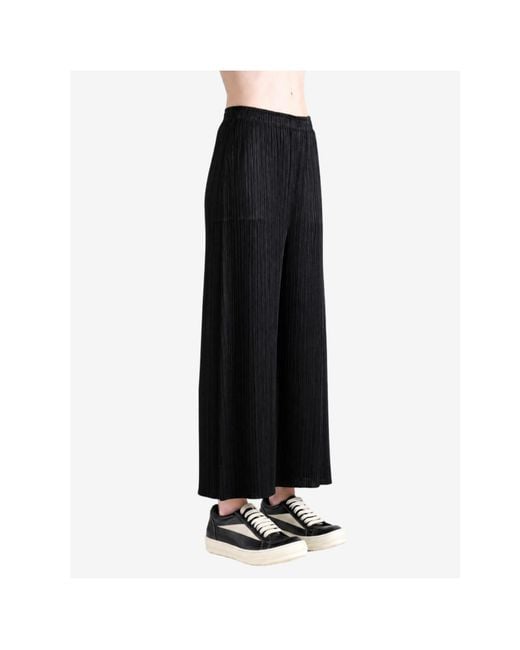 Pleats Please Issey Miyake Black Pleats Please Issey Miyake Pleated Trousers