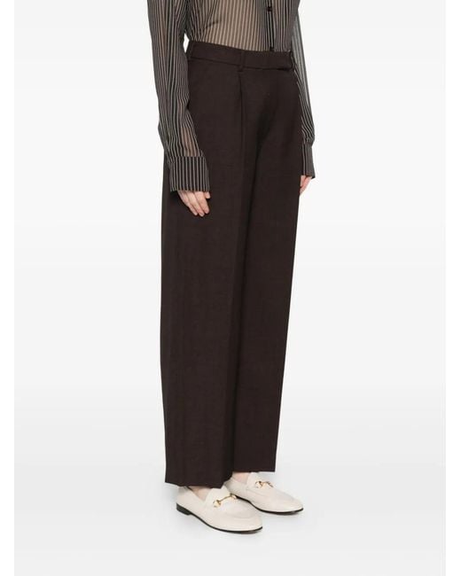 Low Classic Brown Pleated-Front Trousers