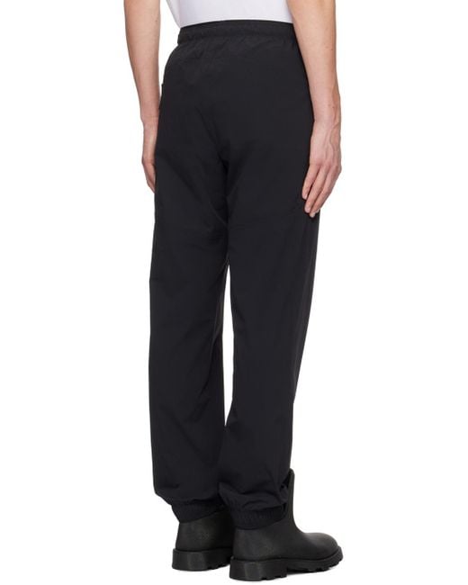 Moncler Black Logo Patch Tapered-Leg Trousers for men