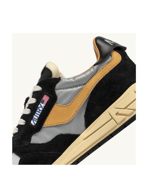 Autry Black Low-Top Sneakers With Mesh And Suede Overlays for men