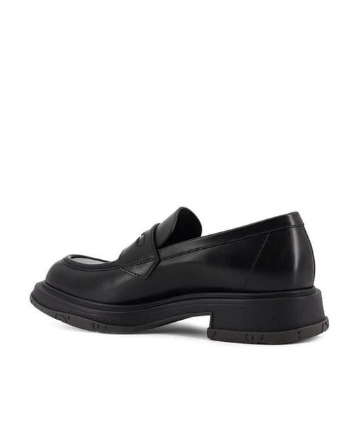 Gucci Black Tonal Logo Loafers for men
