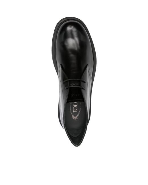 Tod's Black Round Toe Ankle Boots for men
