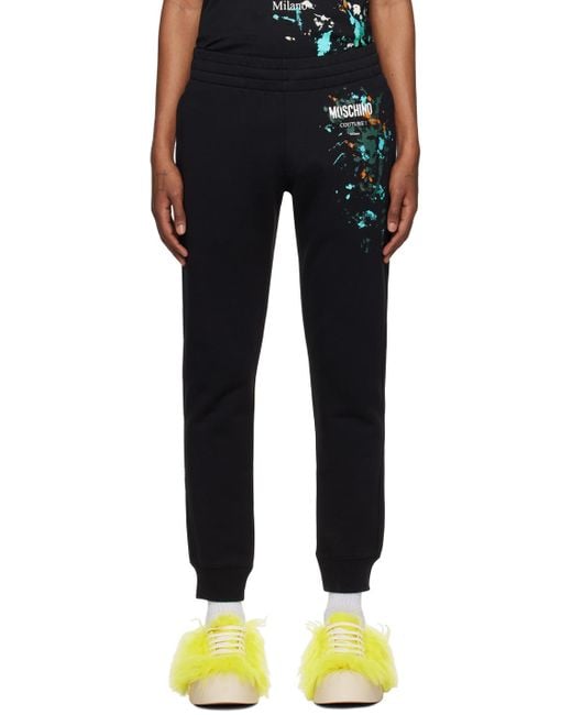 Moschino Black Logo-Printed Trousers for men