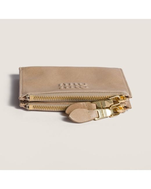 Miu Miu Natural Logo Embossed Zipped Wallet