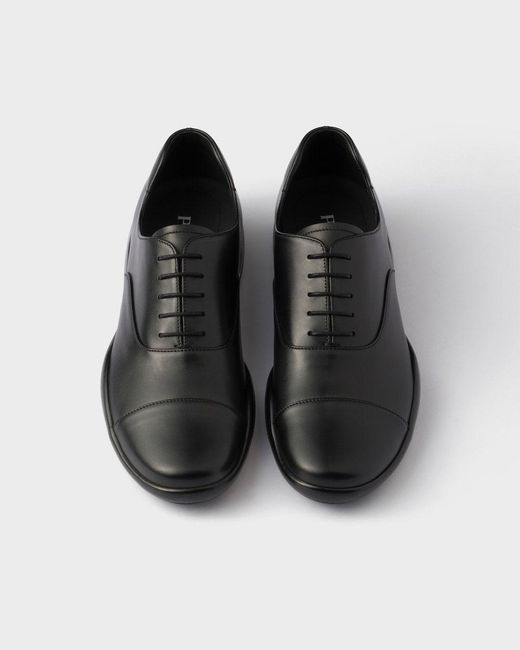 Prada Black Round-Toe Lace-Up Sneakers for men