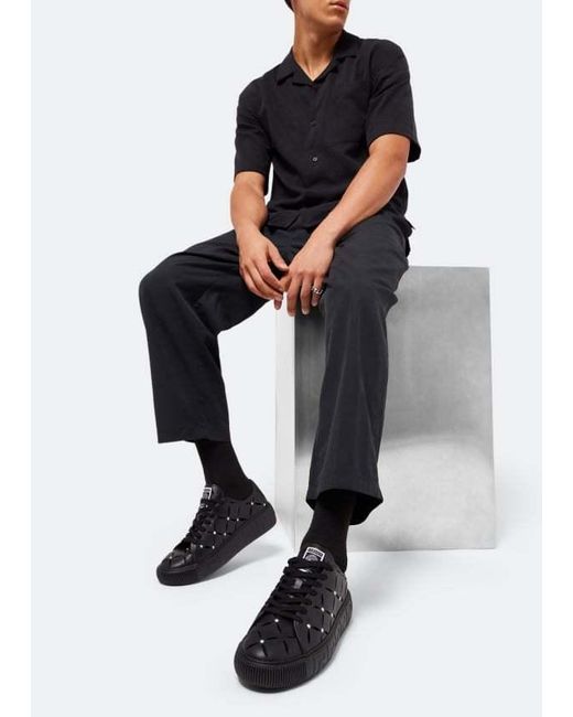 Versace Black Perforated Studded Sneakers for men