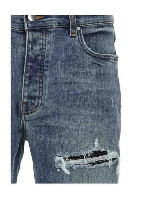Amiri Blue Ripped Jeans for men