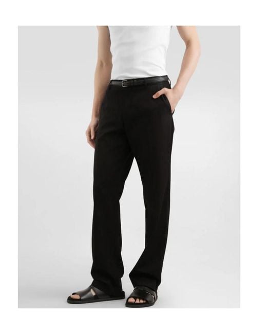Dolce & Gabbana Black Logo Patch Trousers for men
