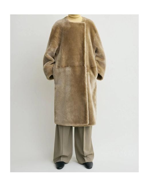 Totême Natural Collarless Shearling Coat Rye