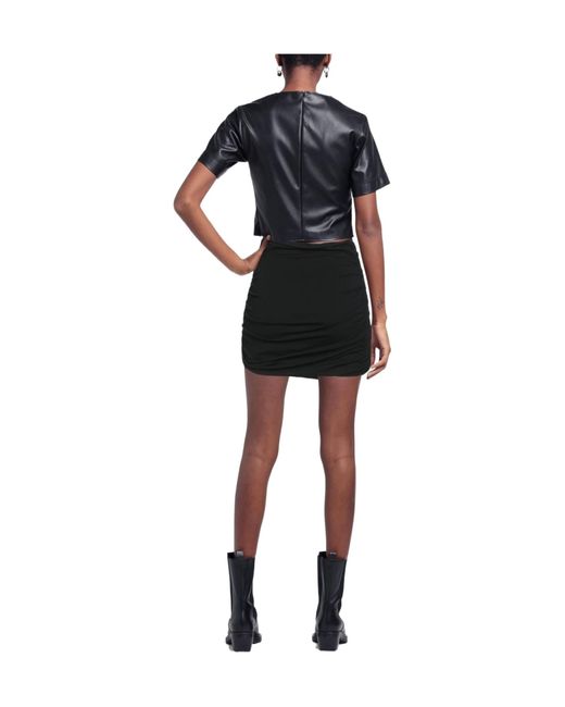 Tory Burch Black Mini Skirts