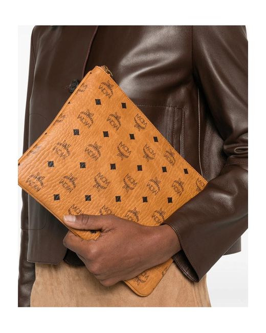 MCM Brown Logo Patterned Zipped Clutch Bag