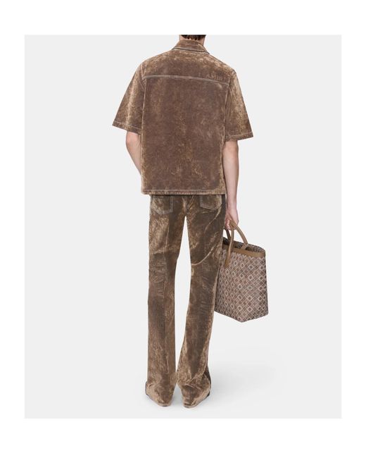 Amiri Brown Logo Embroidered Velvet Jeans for men