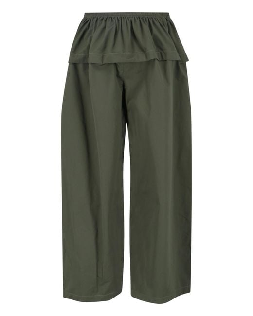 Alaïa Green Alaïa Peplum Detailed Trousers