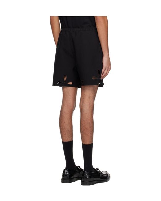 Coperni Black Petal Cut-Out Shorts for men