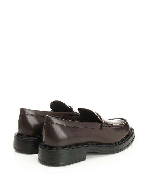 Tod's Black Almond Toe Penny Loafers for men