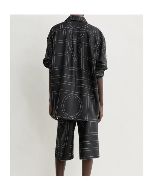 Totême Black Monogram-Embroidered Silk Shirt