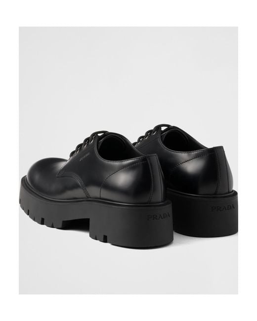 Prada Black Brushed Leather Derby Shoes for men