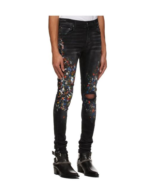 Amiri Black Paint Print Distressed Skinny Jeans for men