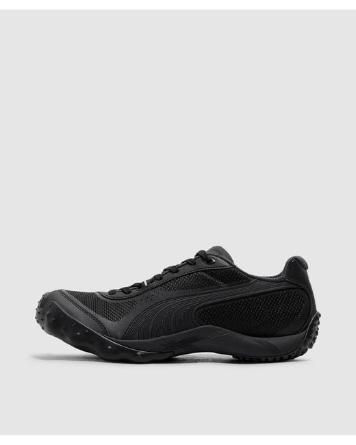 PUMA Black Achillium Sneaker -Flat Dark for men