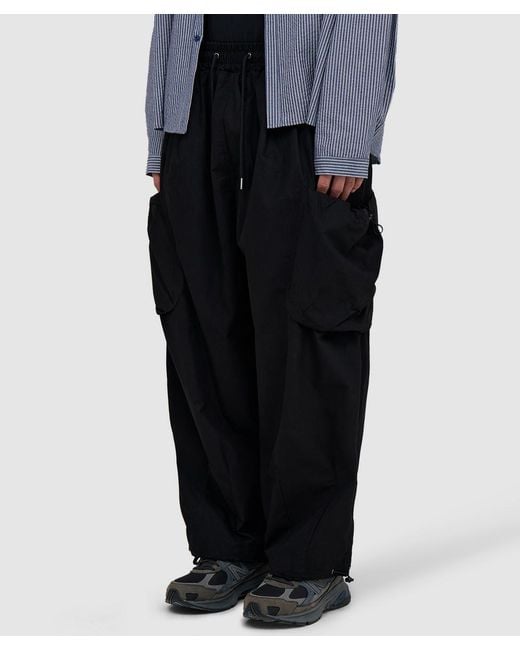 Estudio Niksen Black Bungee Strap Cargo Pant for men