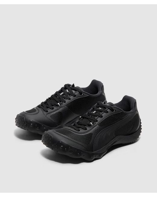 PUMA Black Achillium Sneaker -Flat Dark for men