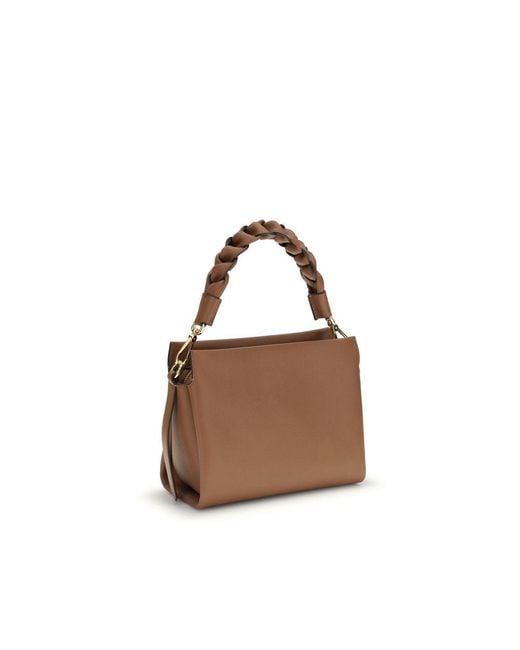 Coccinelle Brown Handbags