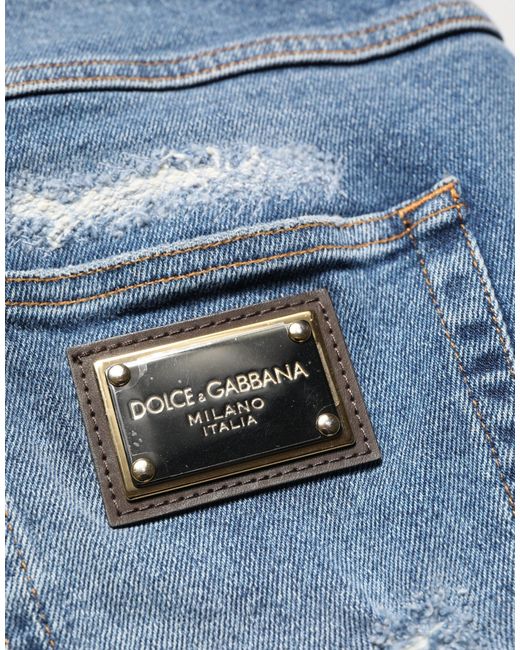 Dolce & Gabbana Blue Cotton Distressed Denim Bermuda Shorts for men