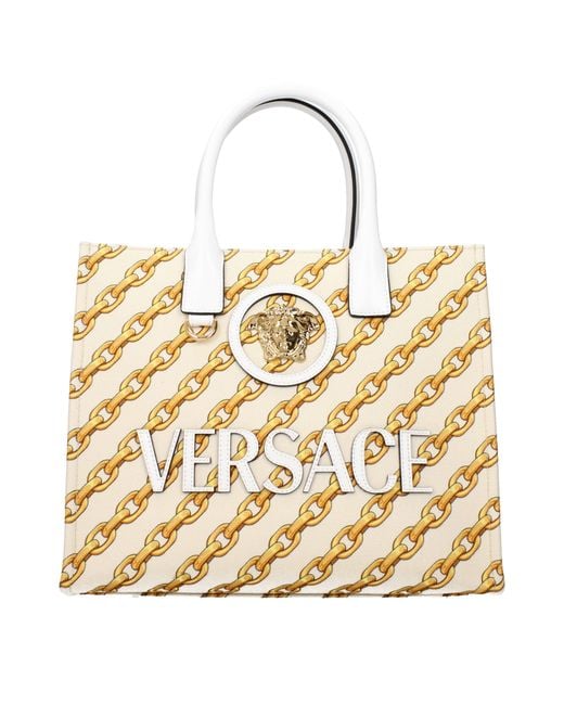 Versace Metallic Beige Fabric Handbag