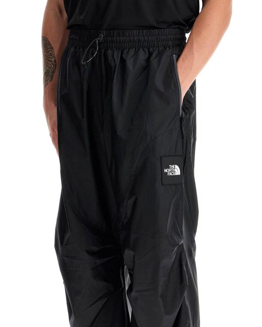 The North Face Black Wind Shell Printed Pants for men