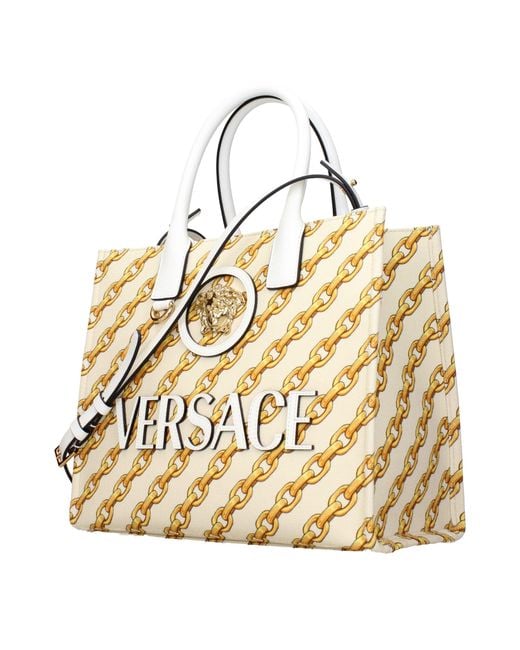 Versace Metallic Beige Fabric Handbag
