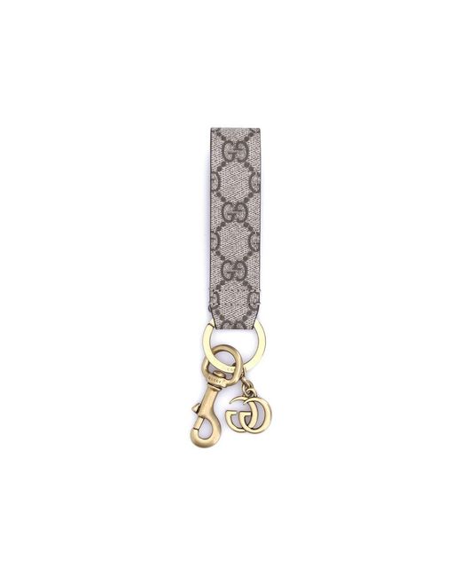 Gucci Metallic Beige Brass Keychain for men