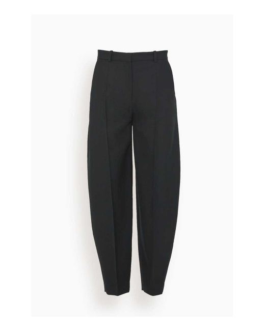 Totême Barrel Leg Trousers In Black Lyst