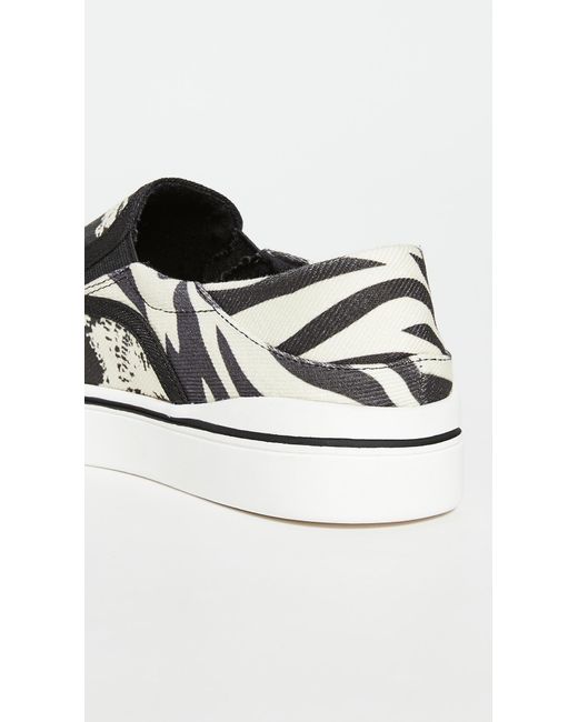 steve madden black and white slip ons