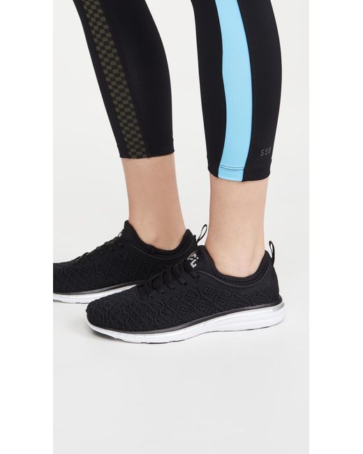black apl sneakers