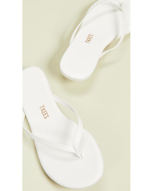 tkees white flip flops