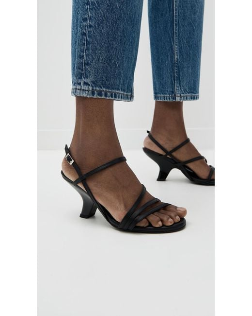 INTENTIONALLY ______ Black Launch Sandals