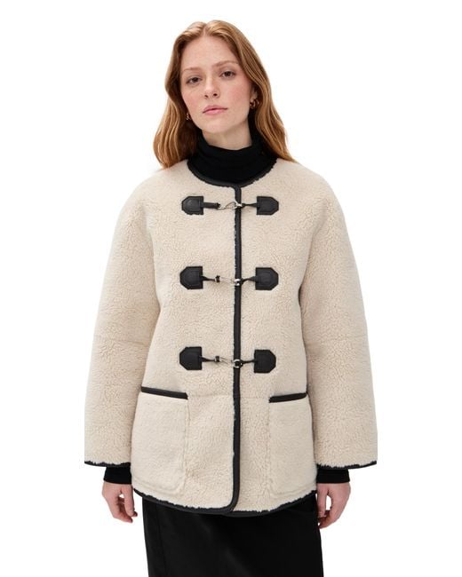 DUNST Natural Collarless Buckled Shearling Jacket