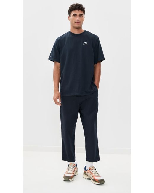 Malbon Golf Blue Bermuda Tee for men