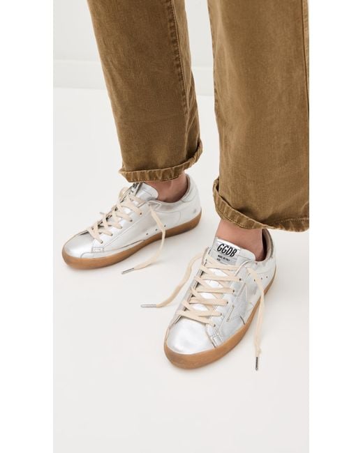 Golden Goose Deluxe Brand White Super-Star Laminated Upper Star Sneakers And Heel With Metal Lettering