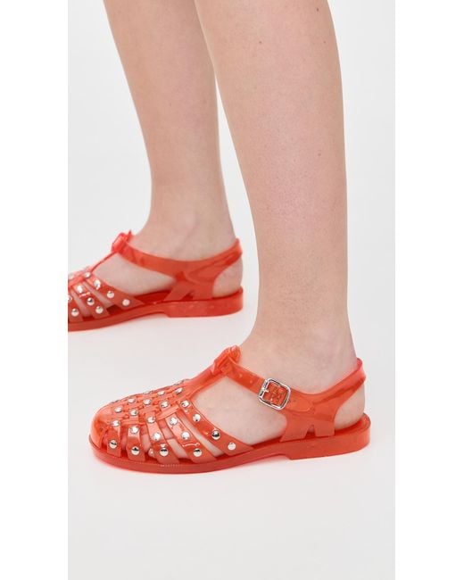 INTENTIONALLY ______ Red Ellery Studded Jelly Sandals