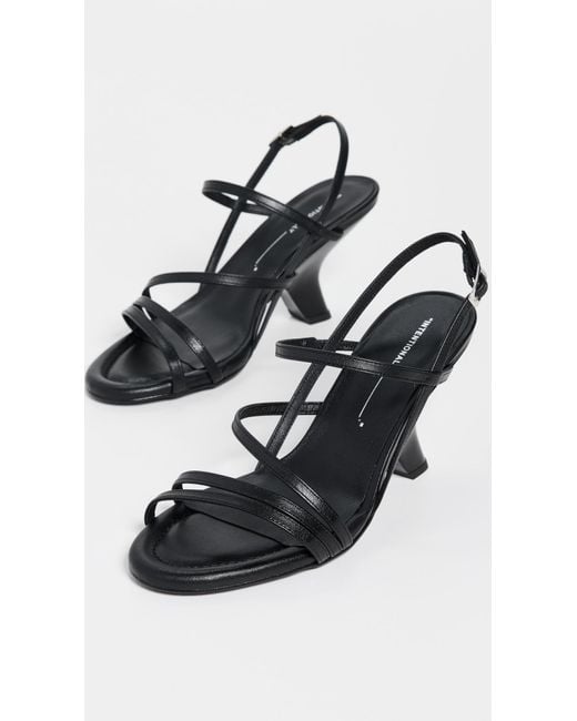 INTENTIONALLY ______ Black Launch Sandals