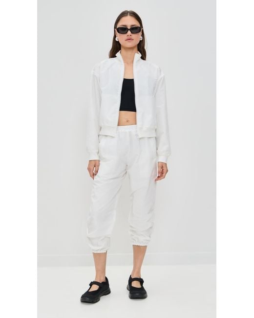 Eugenia Kim Love White Martina Tennis Warm-Up Pants With Ankle Side Zippers