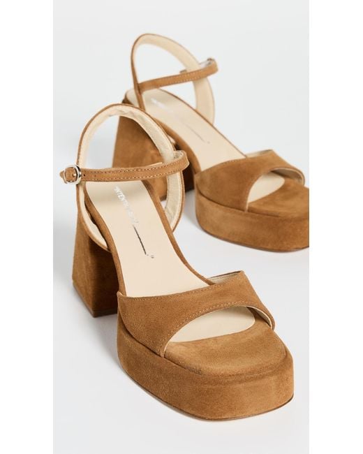 INTENTIONALLY ______ White Tune Sandals