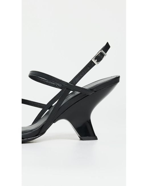 INTENTIONALLY ______ Black Launch Sandals