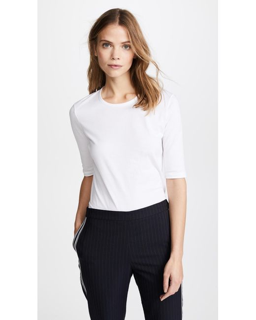 white shirt with elbow length sleeves